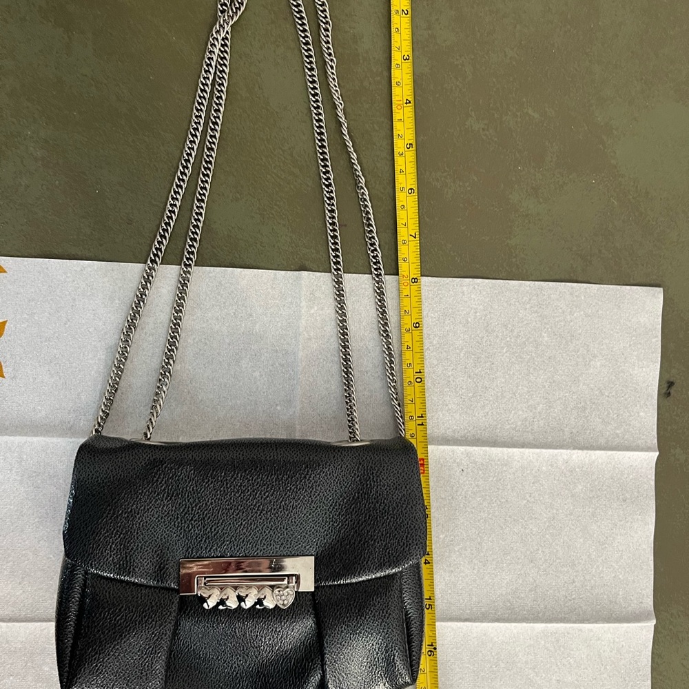 Sleek Black Crossbody Bag with Gold Clasp